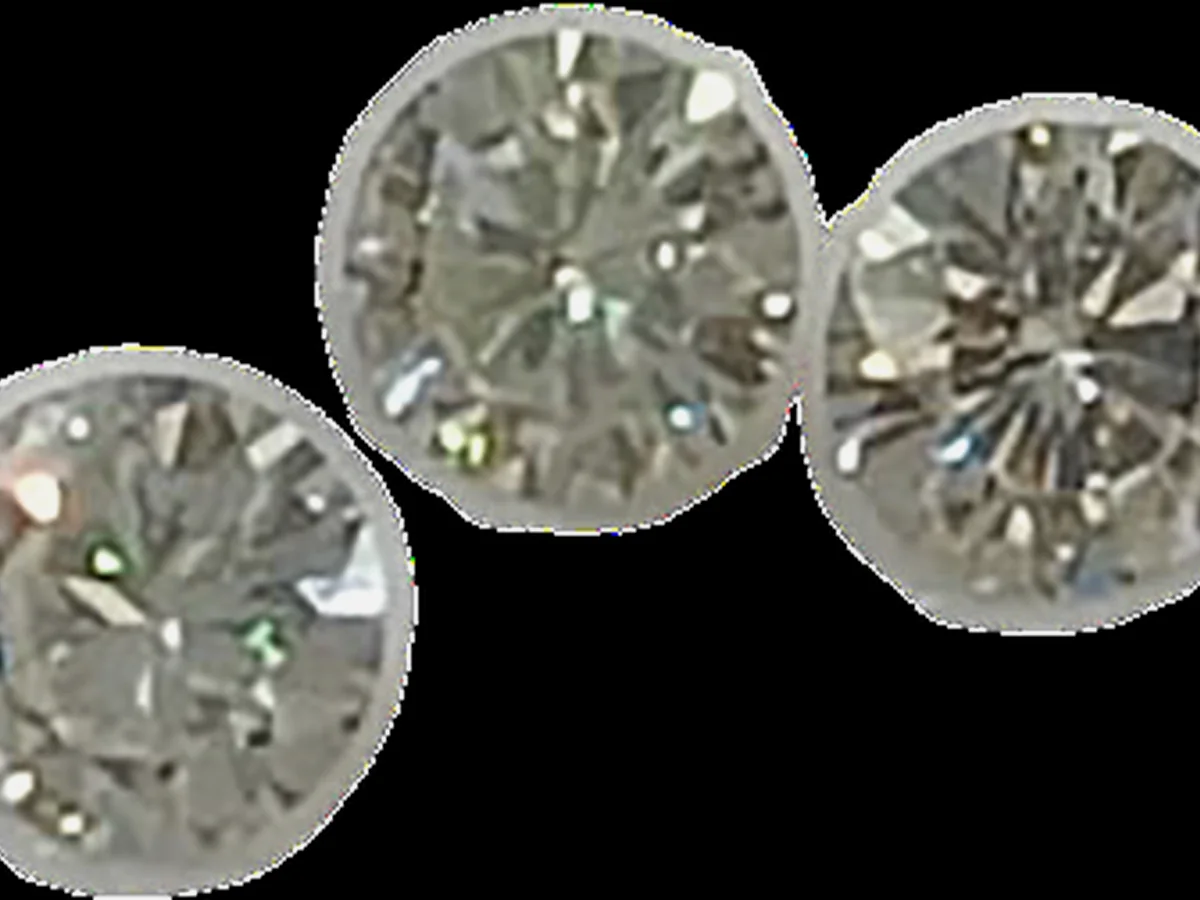 Loose diamonds on black background