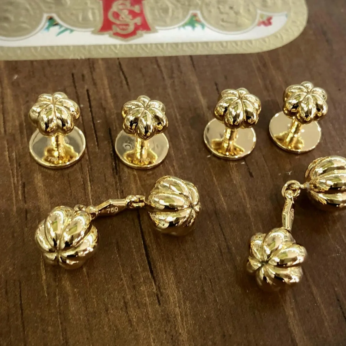 Small gold-toned earrings and components